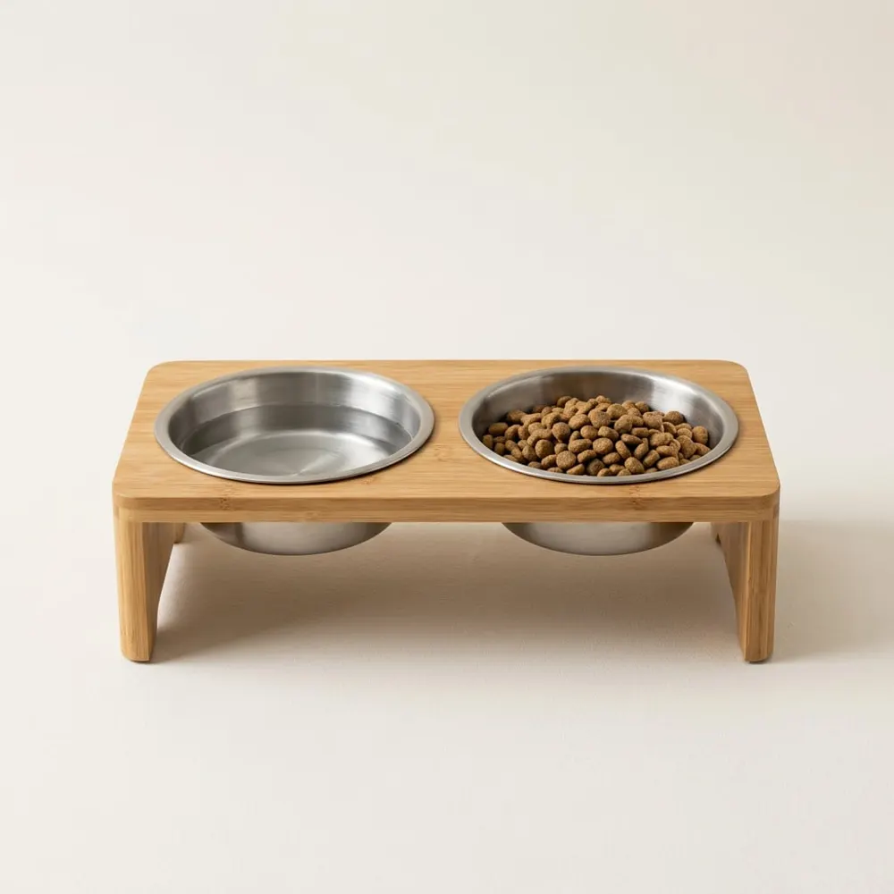 Elevated bamboo feeding stand holding two stainless steel bowls