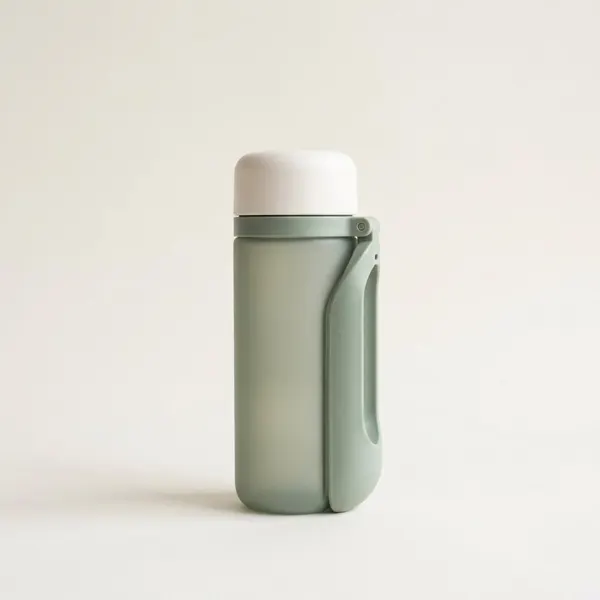 Sage-green portable pet water bottle with fold-out trough